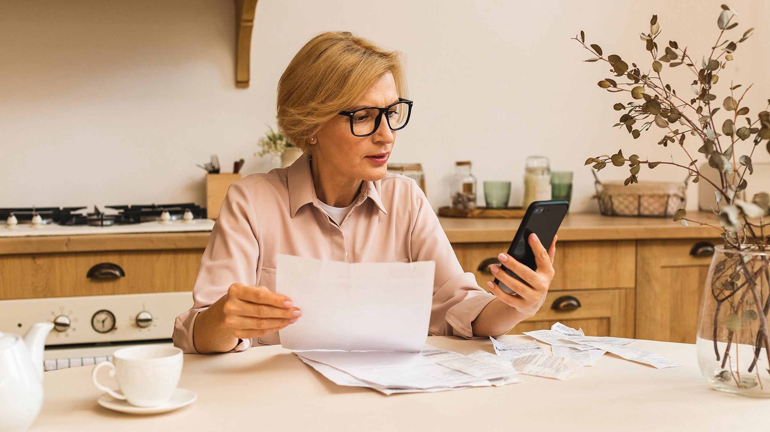 A woman reviews finances. Use FSA or HSA funds for post-surgical recovery equipment before surgery. Smart pre-op planning ensures better healing, tax savings, and optimal positioning from day one.