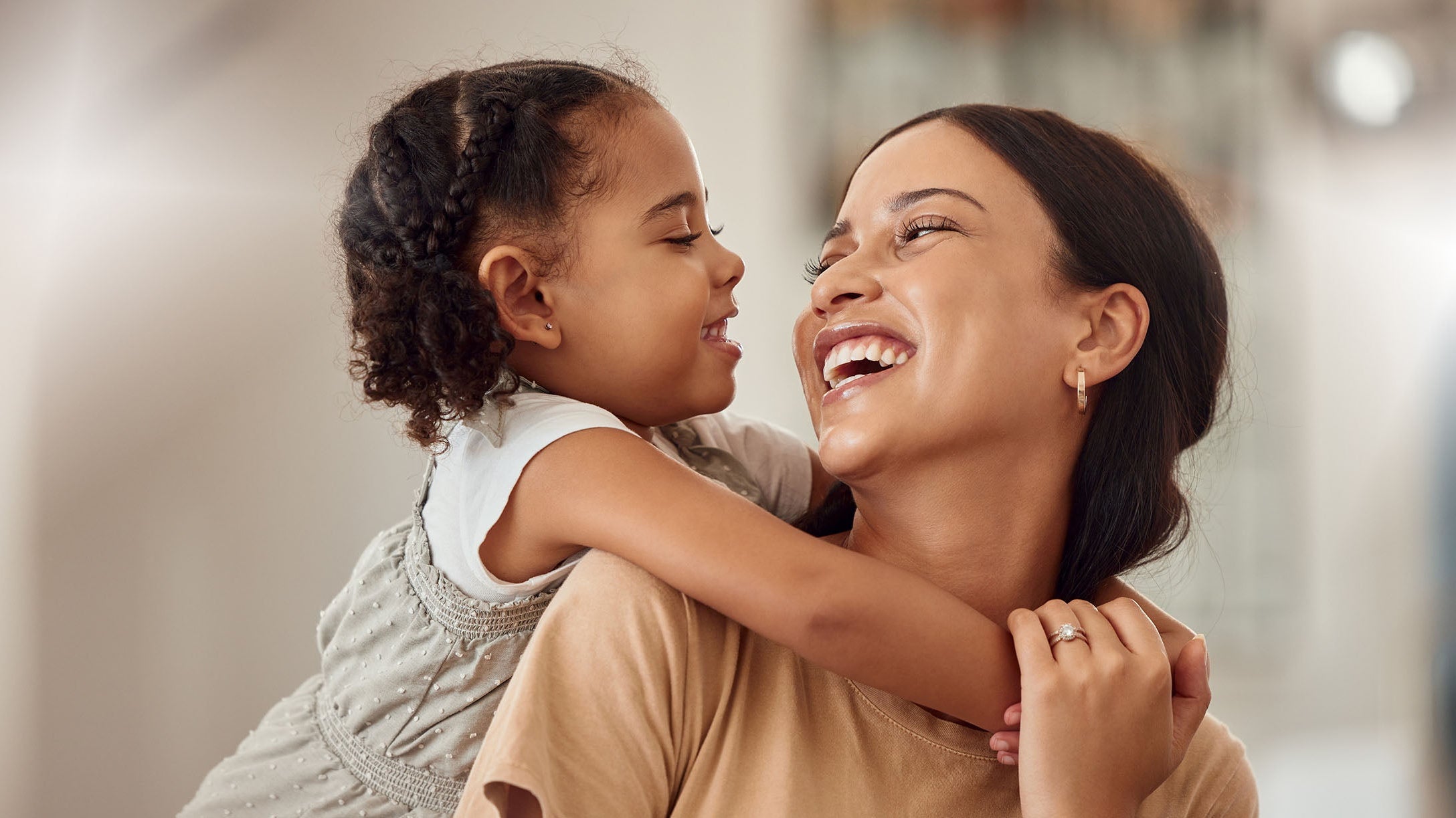 A mother and daughter. Learn how to sleep after a mommy makeover before your surgery date — positions, elevation angles, pillow setups, and a week-by-week recovery timeline.