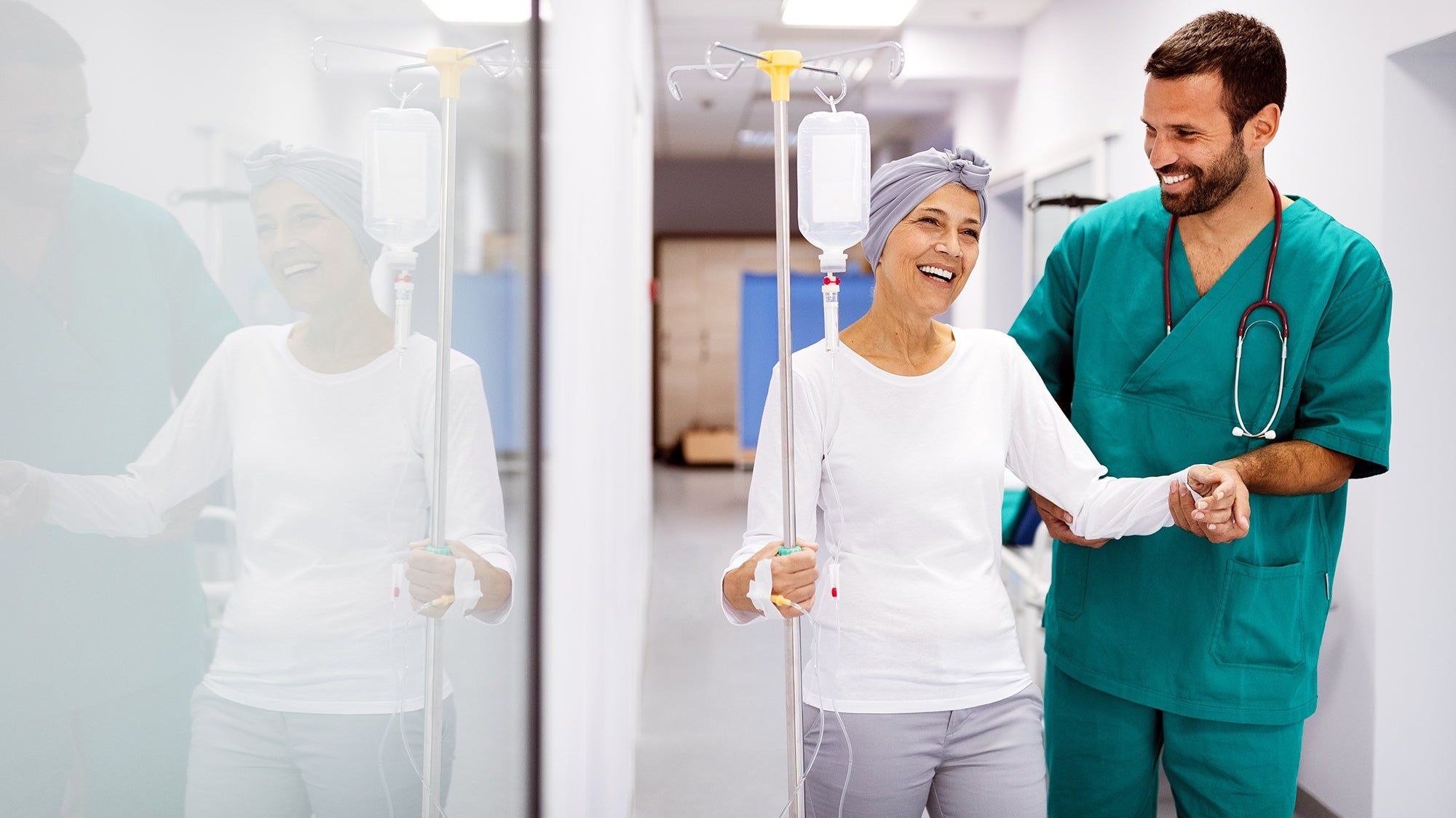 A woman walking with her doctor in a hospital. Planning ahead for cancer surgery recovery can ease the stress. Learn what to expect, common side effects, and how to prepare your home well before surgery