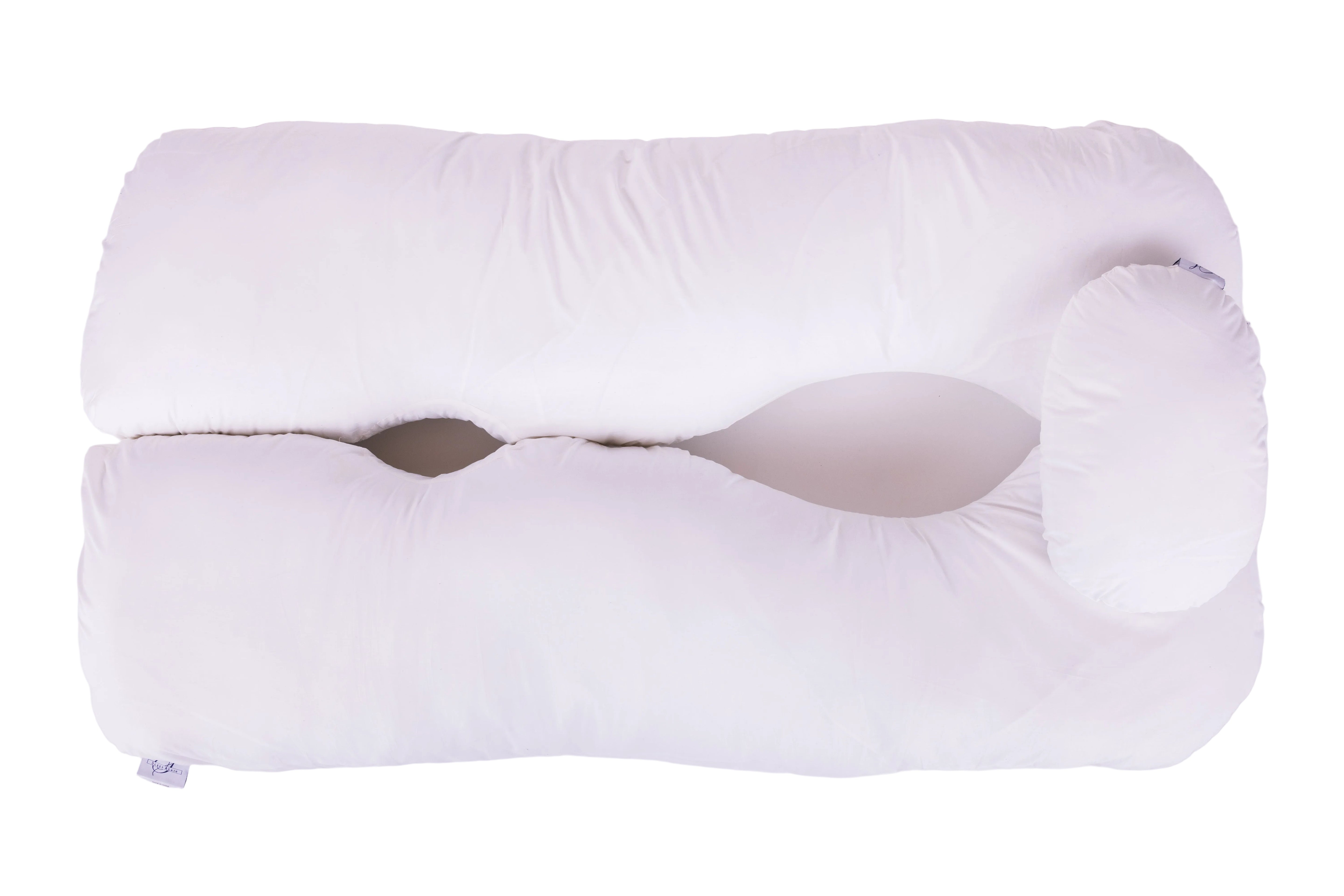 The "Two Side Pillows Sold Separately" is a white ergonomic pillow with a contoured design, central groove, and elevated curved side—ideal for contoured bedding or side sleeping—shown on a plain white background.