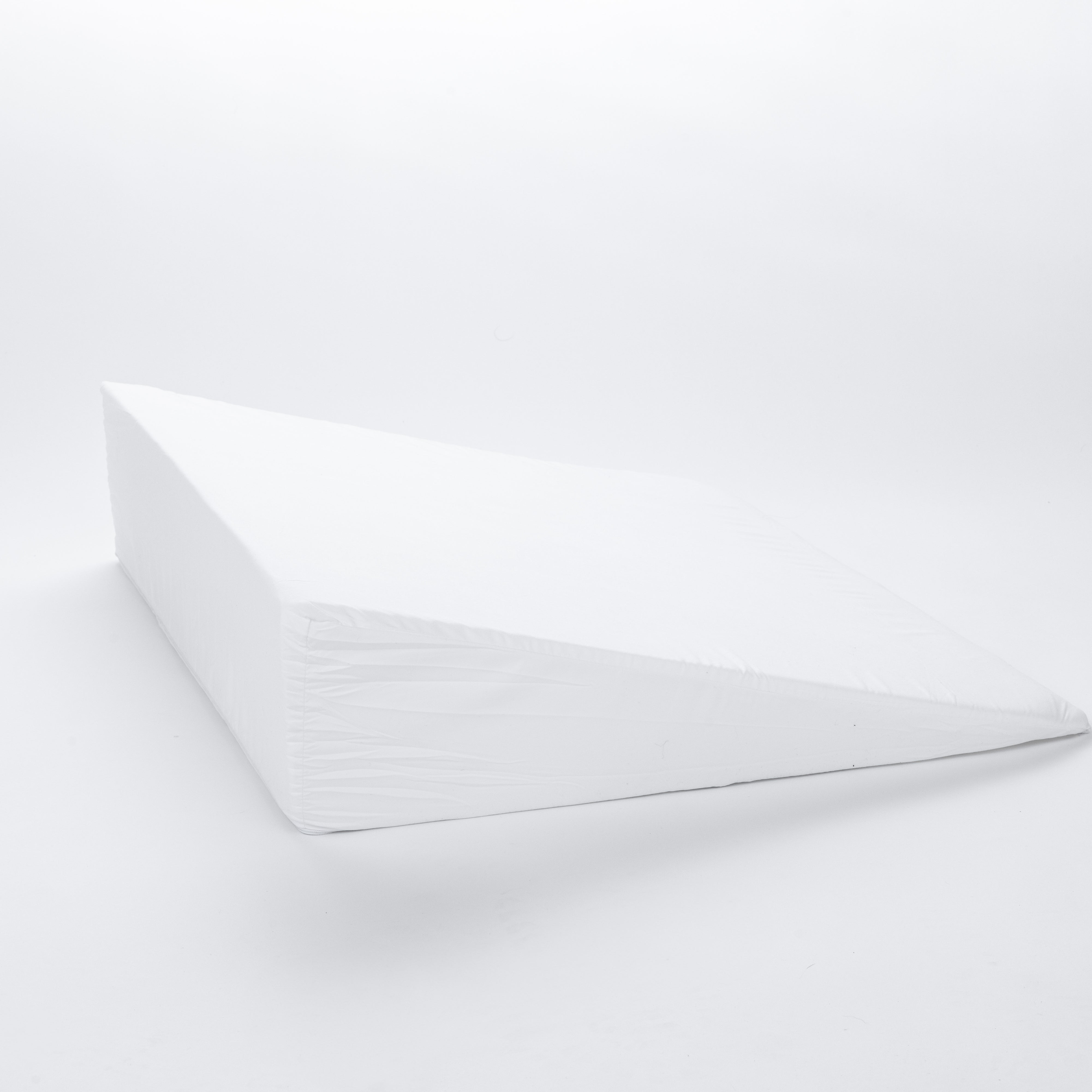 The Individual Wedge Pillow Sold Separately, made of extra firm foam in white, is shown on a plain white background with its sloped side facing the viewer.