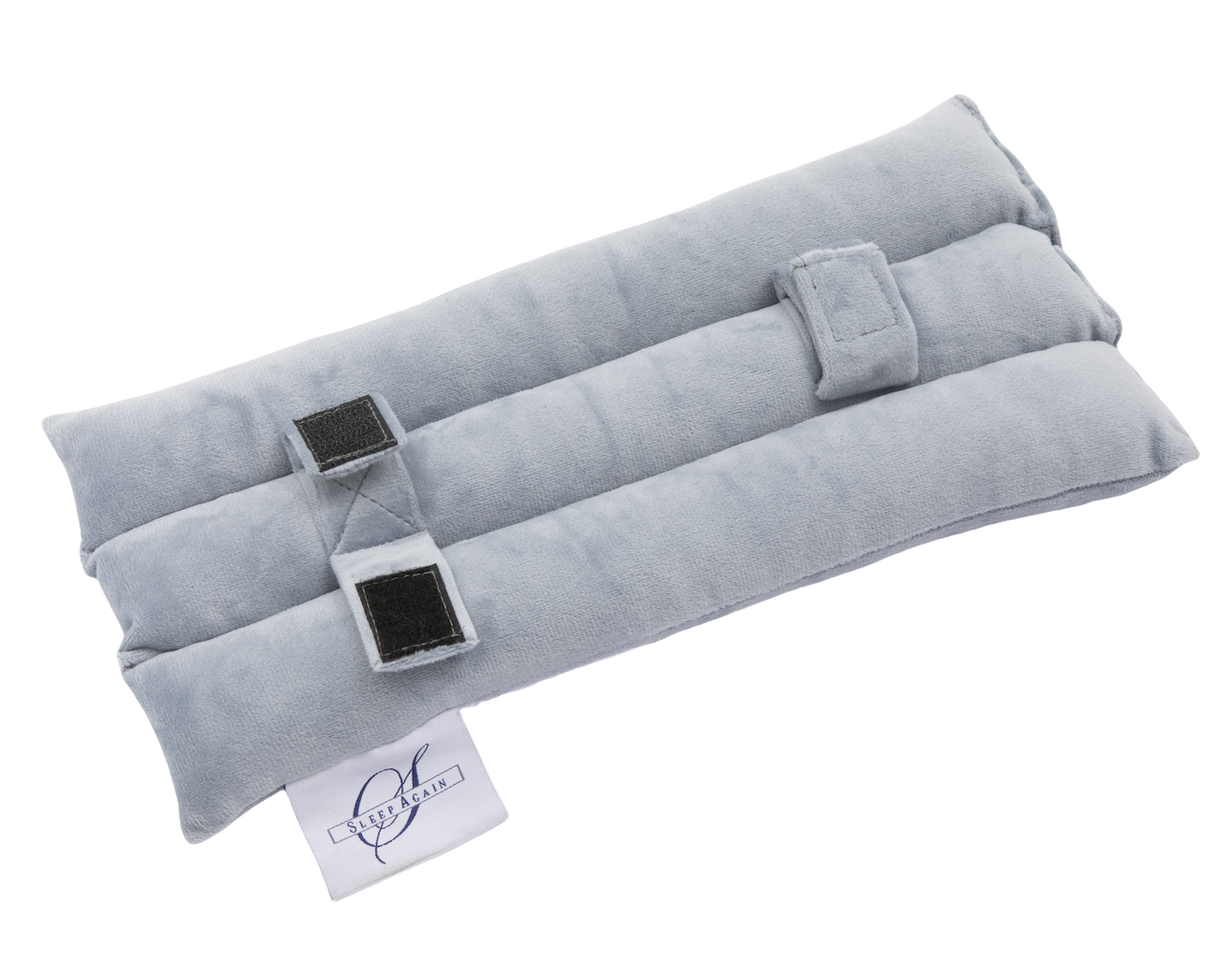 The Seat Belt Pillow is a soft, rectangular, light gray fabric wrap with two fold-over straps and Velcro fastenings, featuring a white logo tag on one end. Ideal for chest support after surgery, it's shown on a white background.