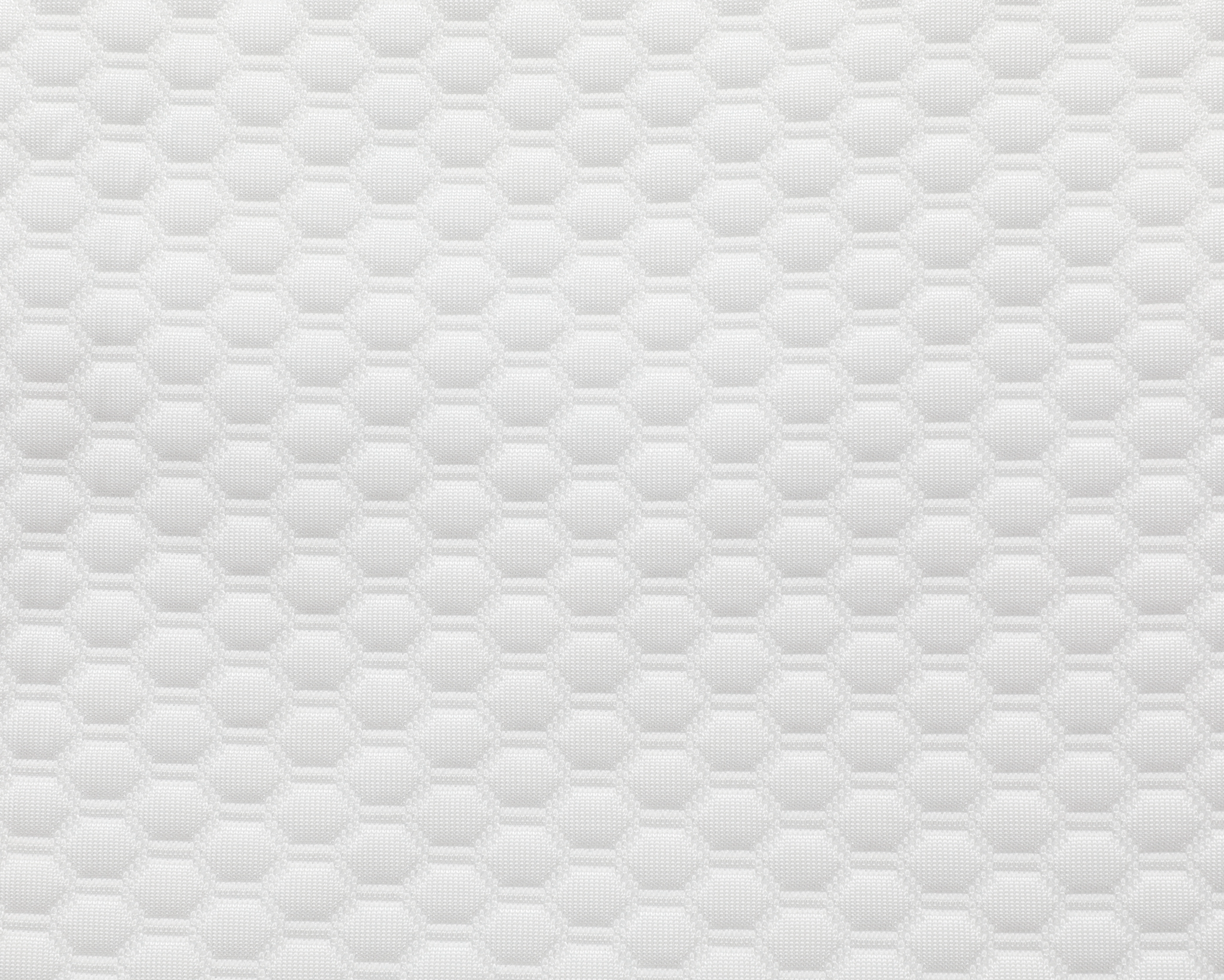 The Cooling Fitted Sheet for the Sleep Again Pillow System features a hexagonal honeycomb pattern with a subtle 3D effect on white, providing a textured, geometric look—perfect for hot sleepers or pairing with your pillow system.