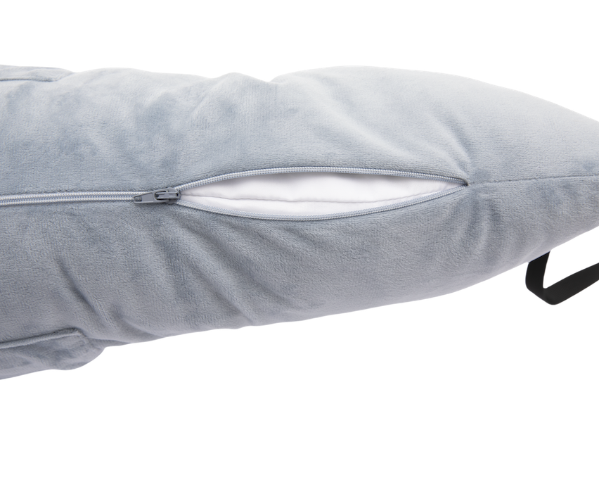 A close-up of the gray Chest Pillow shows a soft, plush texture, a black handle on the right, and a partially open zipper revealing its white inner lining—ideal as a supportive post-surgery pillow.
