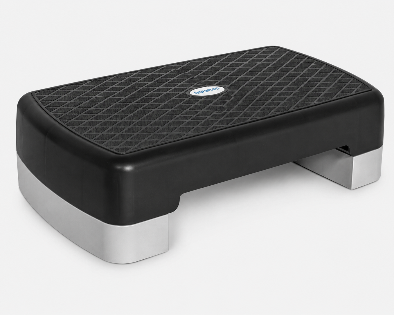 A black and gray rectangular Bedside Step Stool with a textured, non-slip surface and short legs, this versatile step platform is ideal for fitness exercises.