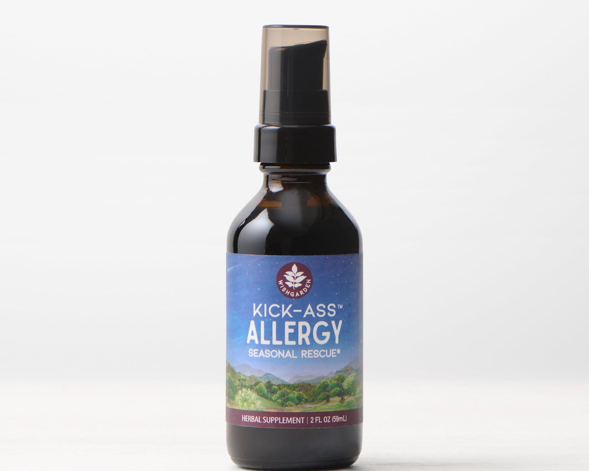 A 2 fl oz (59 ml) dark glass spray bottle of Kick-Ass Allergy, Seasonal Rescue stands on a light surface with a plain white background, offering natural allergy relief.
