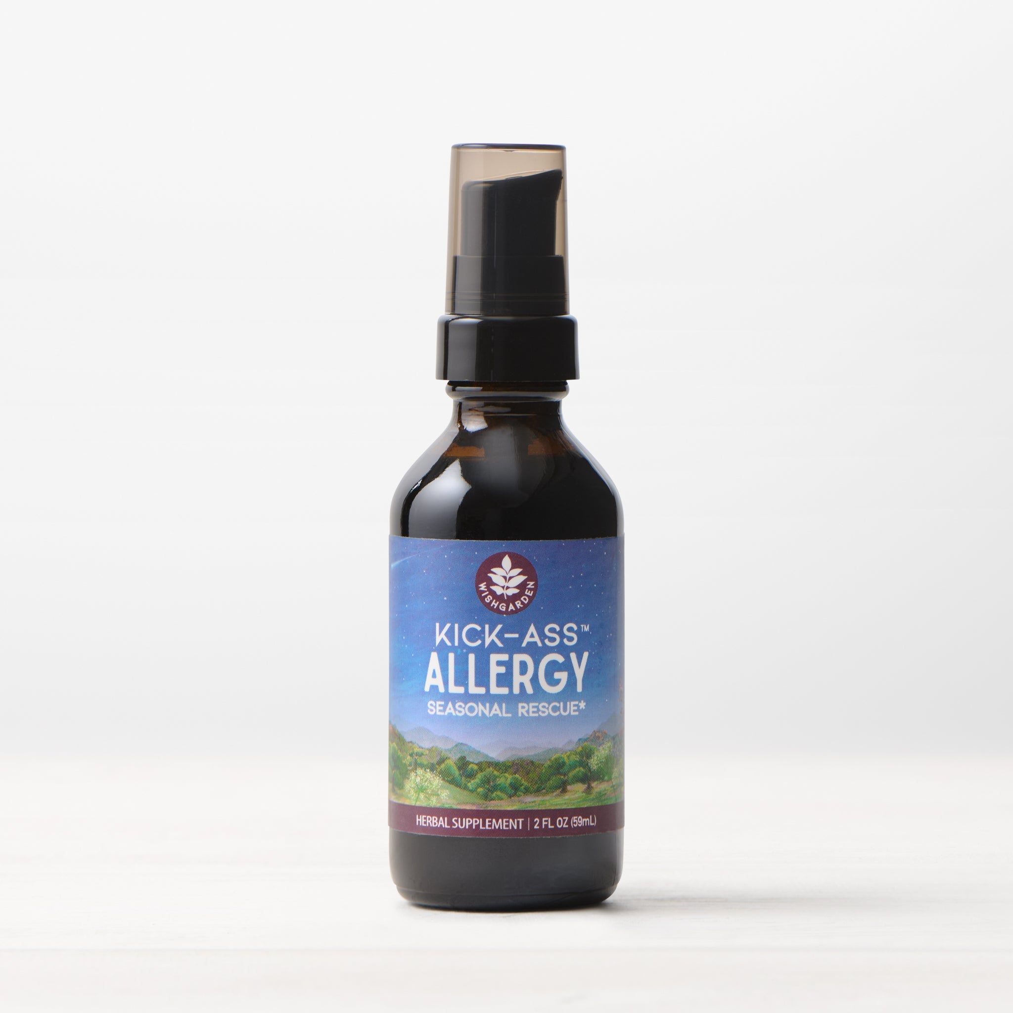 A 2 fl oz (59 ml) dark glass spray bottle of Kick-Ass Allergy, Seasonal Rescue stands on a light surface with a plain white background, offering natural allergy relief.
