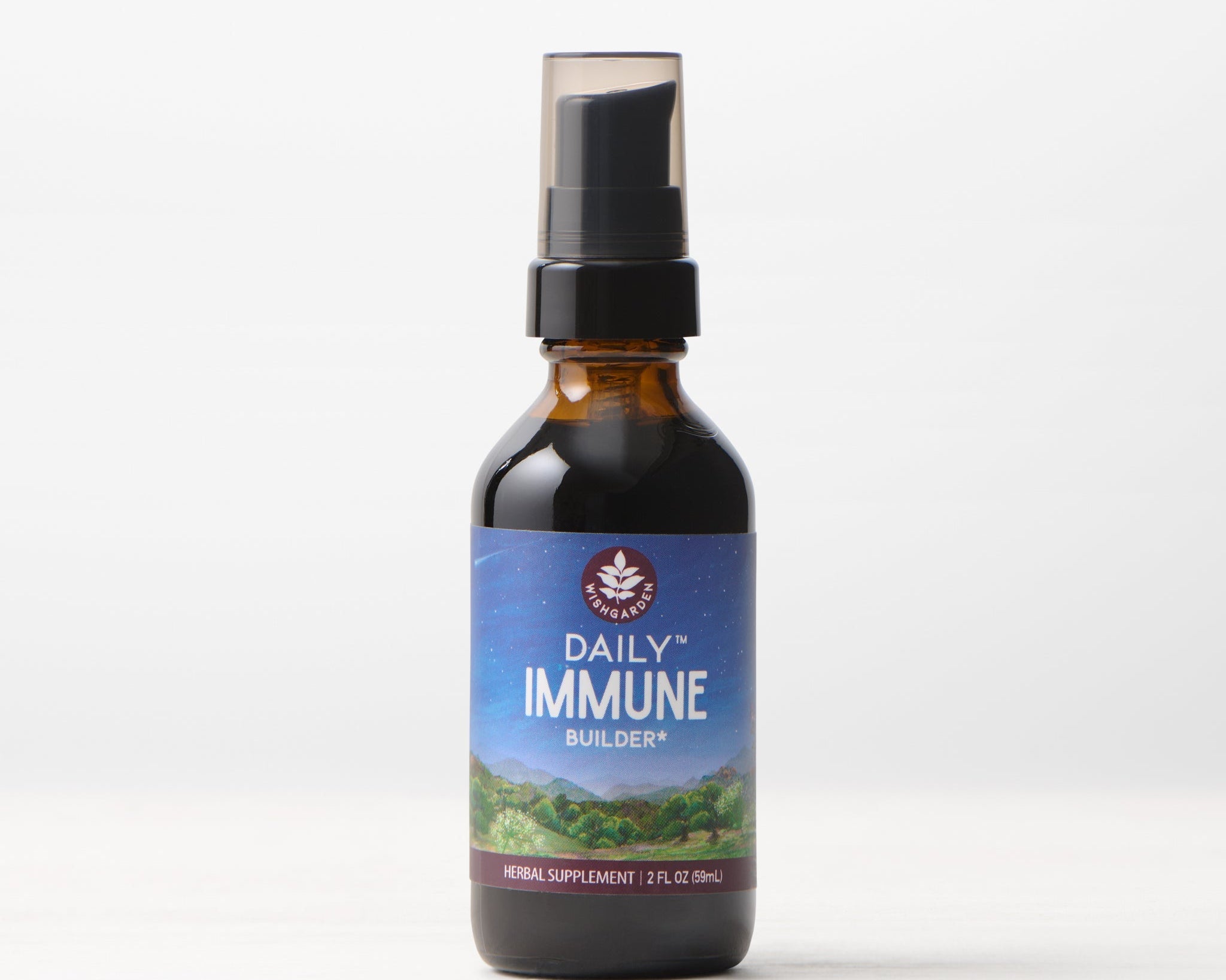 A 2 fl oz brown glass spray bottle of Daily Immune Builder herbal supplement with a blue and green label, leaf logo, and nature scene emphasizing daily immune support, displayed on a plain white background.