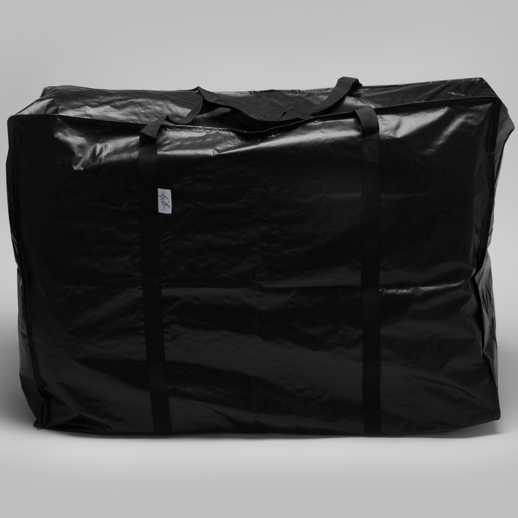 The Travel and Storage Bag for Sleep Again Pillow System is a large, black, water-resistant bag with two handles. Spacious and durable, it stands upright against a gray background—perfect for organizing essentials on the go.