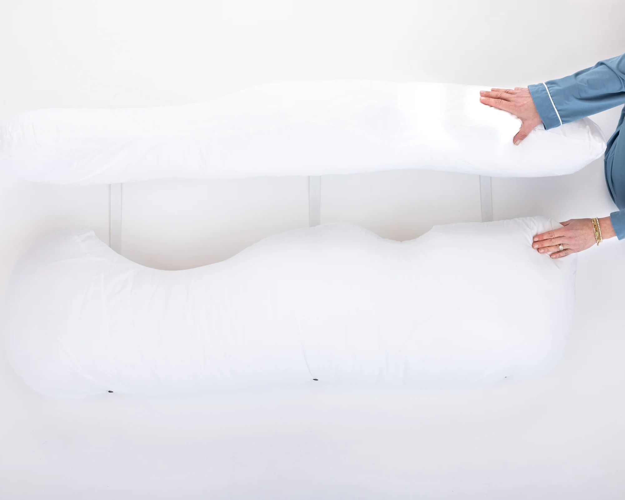 A detail photo showing the Straps with Clasps, a popular add-on accessory with the Sleep Again Pillow System. Shop all pillow accessories and have everything you need for ultimate comfort and healing.