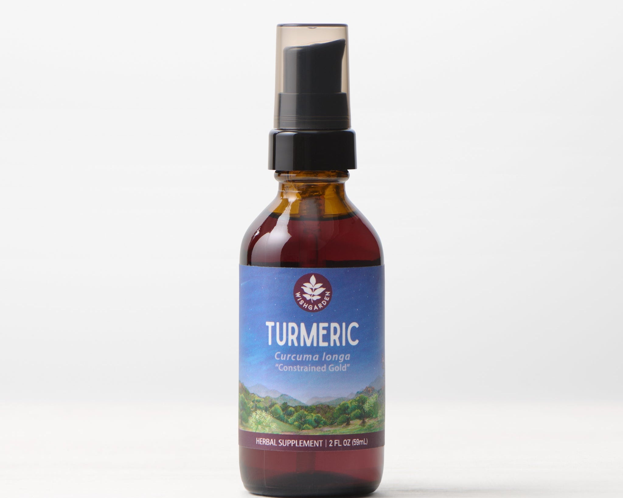 A brown glass bottle with a black pump labeled "Turmeric" for joint health, 2 fl oz (59 ml), stands on a white surface against a light background.