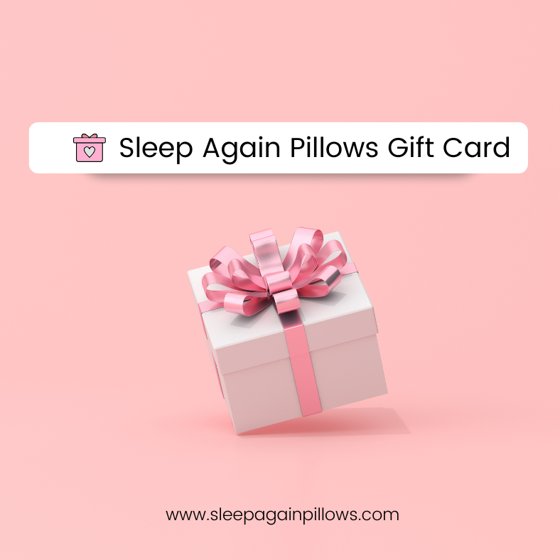 A white gift box with a pink ribbon sits on a pink background. Above, a banner reads "Gift Cards from $50," symbolizing comfort. At the bottom, www.sleepagainpillows.com appears next to a charming gift icon.