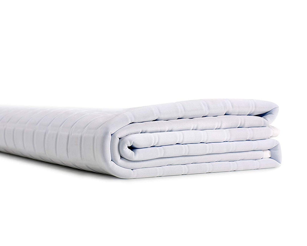 A neatly folded white quilted mattress protector on a white background pairs perfectly with the Final Sale: Opulence Glacier Blanket | Cooling & Weighted for a comfortable and restful night's sleep.