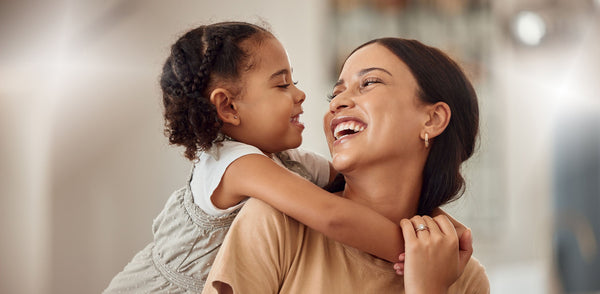 A mother and daughter. Learn how to sleep after a mommy makeover before your surgery date — positions, elevation angles, pillow setups, and a week-by-week recovery timeline.