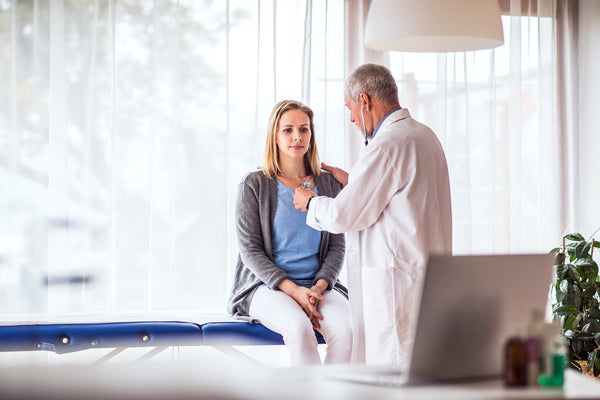 A doctor listens to a woman's heart. Preparing for open heart surgery? Learn which sleeping positions are safe, which to avoid, and how to set up your sleep environment before you come home from the hospital.