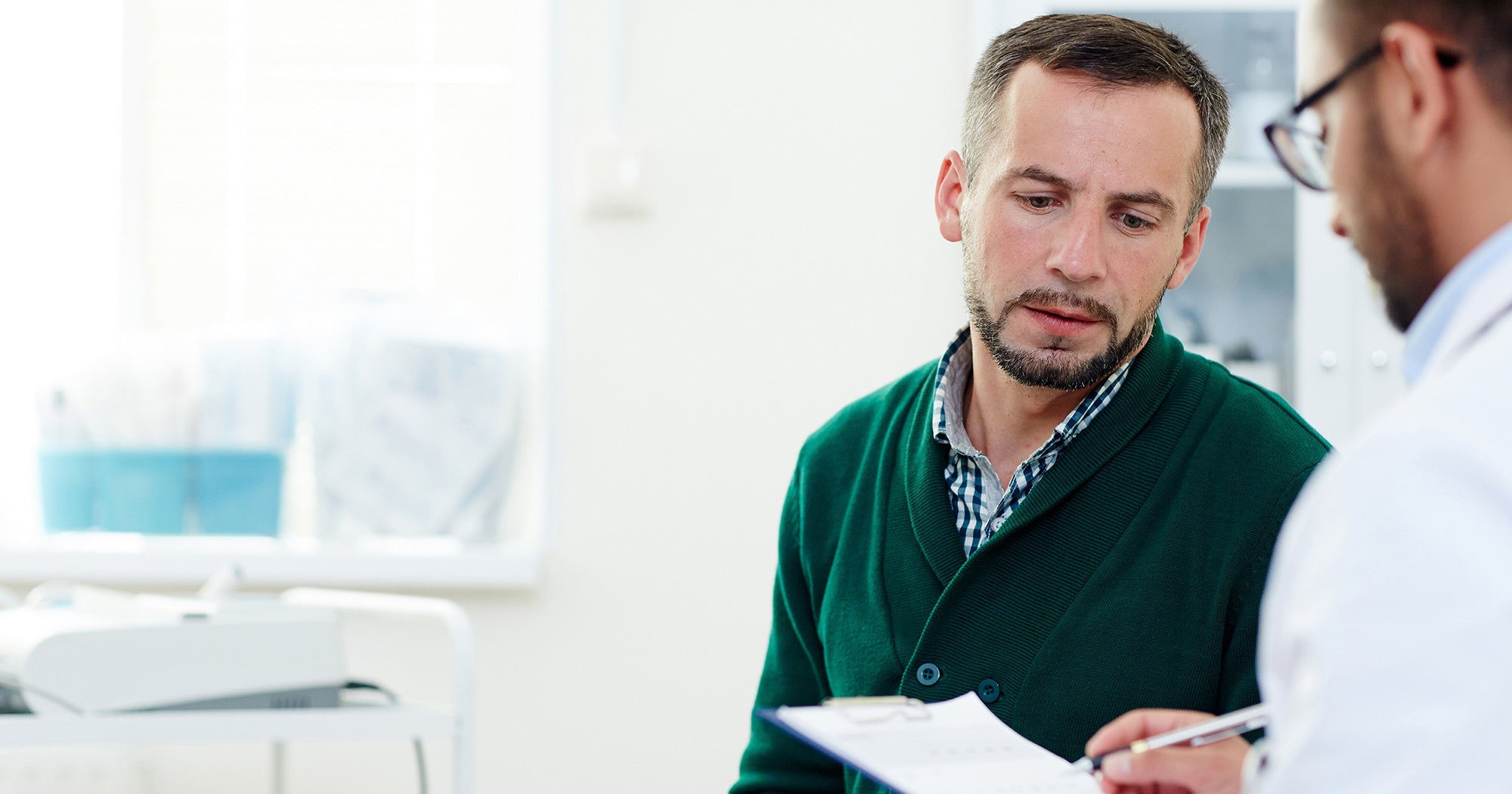 A man talks to his doctor. Most colorectal surgery patients aren't ready for recovery sleep. Here's the positioning guide and setup checklist to have in place before you come home. 