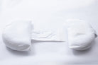 The Side Sleeping Chest Pillow is a white breast surgery pillow with two half-moon cushions joined by a central fabric strap, designed for post-surgery support and comfort while side sleeping, shown against a white background.