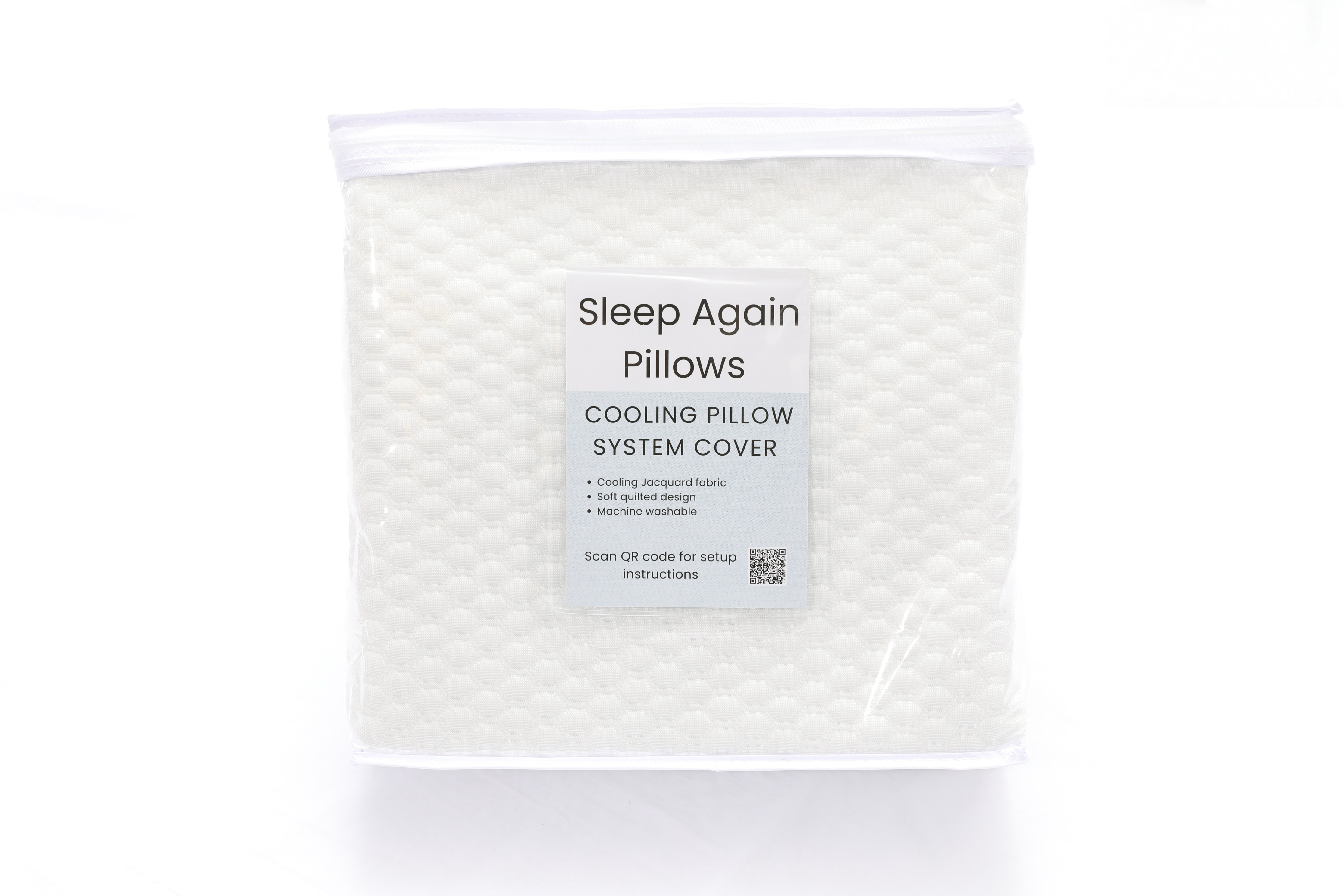 A packaged Cooling Fitted Sheet for the Sleep Again Pillow System with a textured white surface, label highlighting cooling jacquard fabric, soft inner cover, machine washability, and QR code—ideal for hot sleepers or pairing with a cooling pillow cover.
