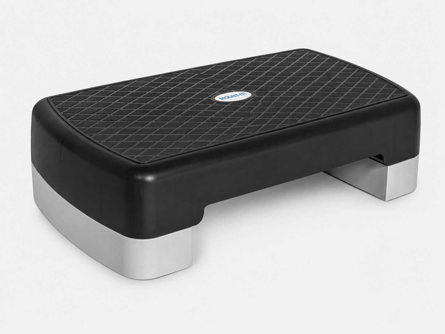 A black and gray rectangular Bedside Step Stool with a textured, non-slip surface and short legs, this versatile step platform is ideal for fitness exercises.