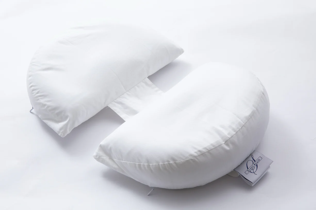 Breast pillow for side sleeping with adjustable chest support. Prevents rolling, reduces shoulder tension, and maintains spinal alignment. HSA/FSA eligible.