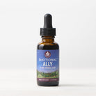 A brown glass dropper bottle labeled Emotional Ally: A Big Herbal Hug rests on a light surface with a simple background. The label, showing a nature scene, identifies this 1 fl oz herbal supplement as a blend for mood and emotional support.