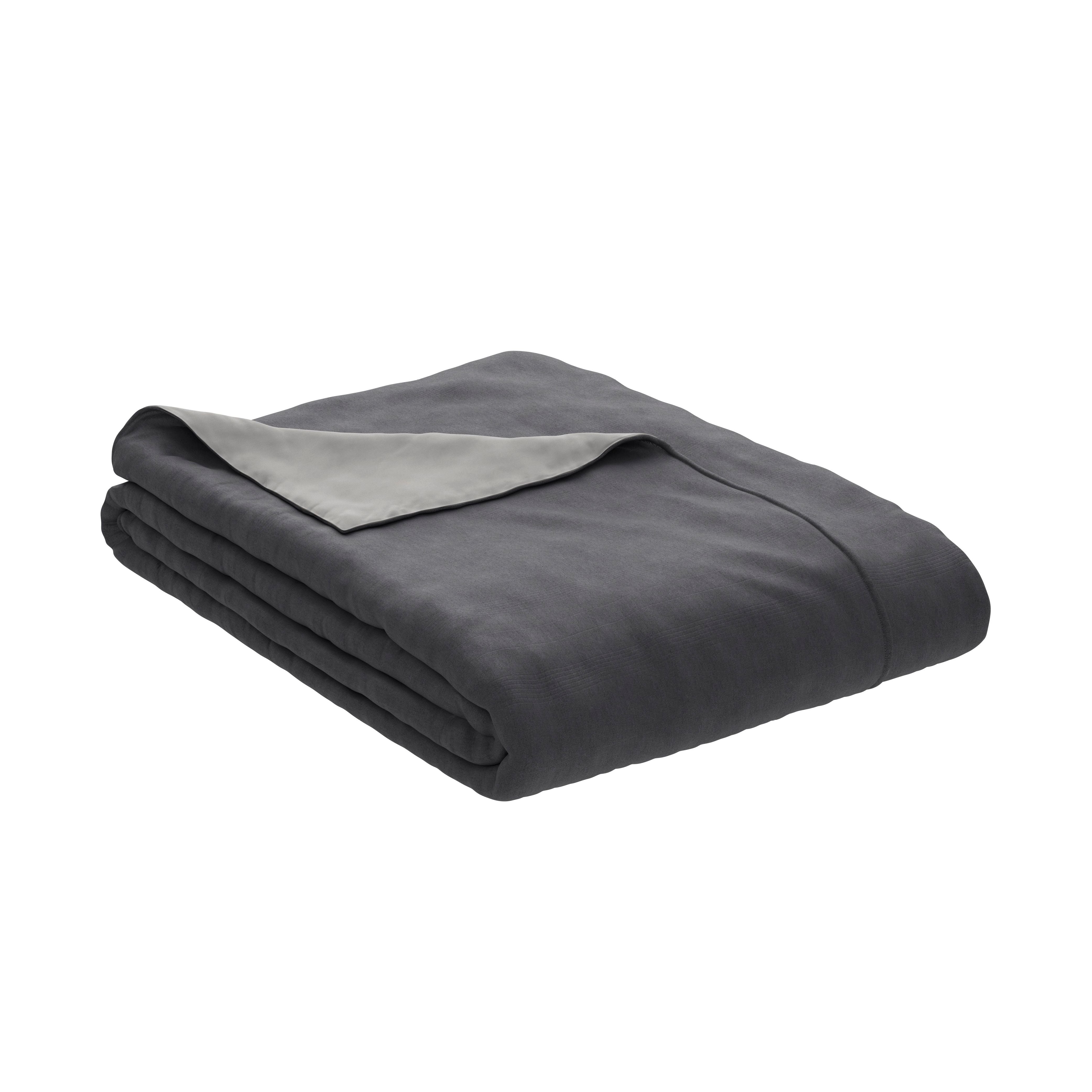 A folded PureCare Duvet Cover | Cooling Bamboo in dark gray with a light gray inner lining, dual-sided and neatly stacked on a white background.
